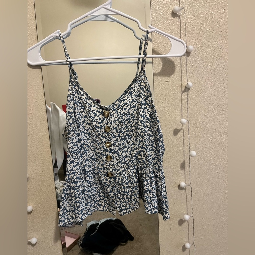 Blue and white floral and flowy tank top.